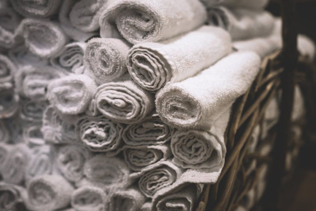 This photo shows a bunch of clean towels.