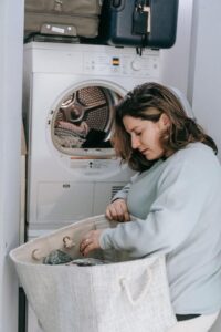 Woman sorting laundry
